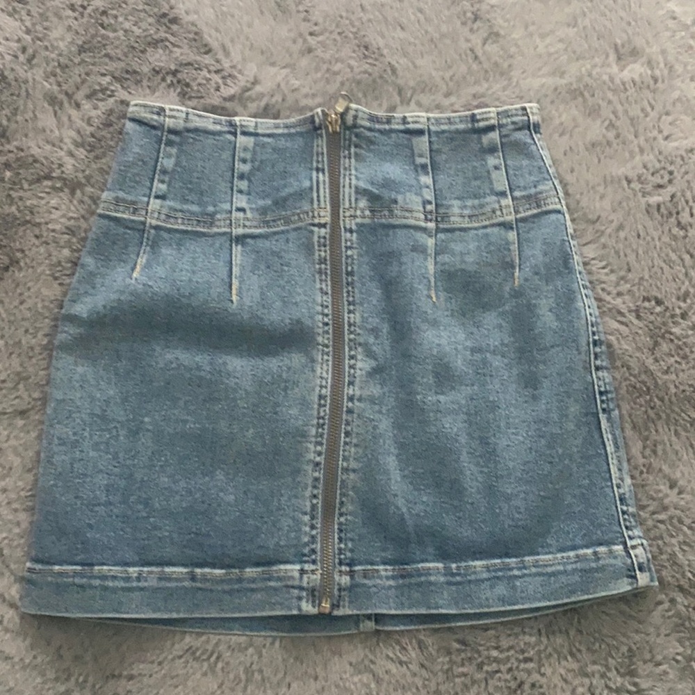 Denim skirt with zipper down middle.